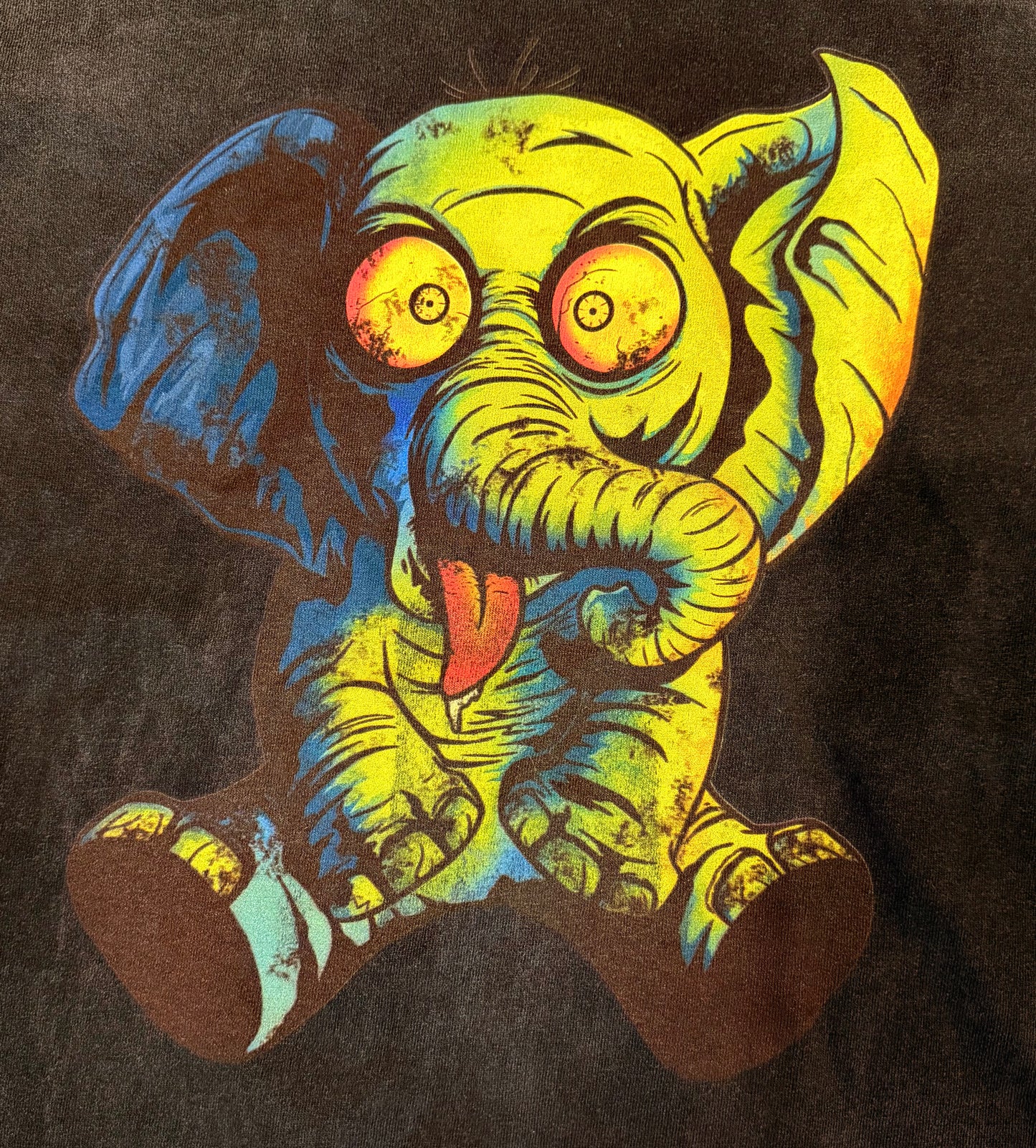 Close-up of the Crazy Elephant graphic print, CHILLBAEBEEE WORLDWIDE limited edition tee